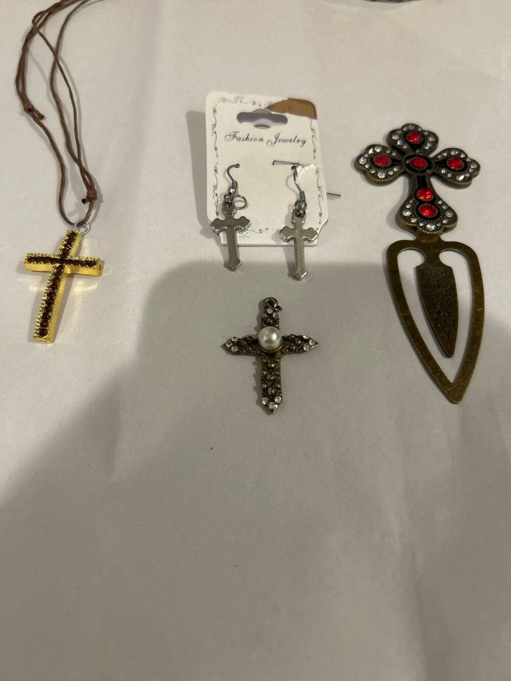 Lot of Miscellaneous religious pieses - earrings, cross pendants, cross pendants